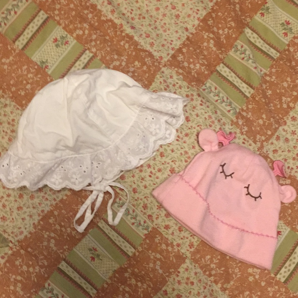 Two 0-3 months hats.
